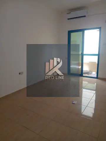 One-bedroom apartment with a living room in Al Qasimia available for annual rent, suitable for families. The apartment features central air conditioni