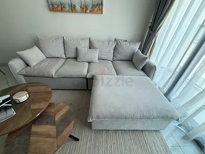 Light grey L-shaped fabric sofa with chaise - great condition