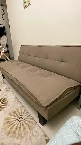 Light brown 3-seater sofa bed in good condition
