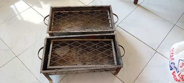 Pair of small portable charcoal grills / braziers