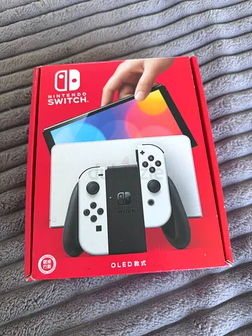 Nintendo Switch OLED (White) - Boxed, Never used.