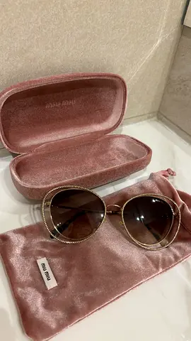 Miu Miu Woman glasses