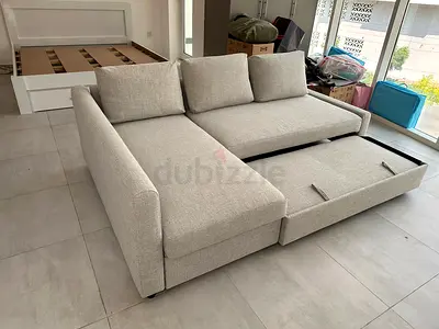 Comfortable L-Shaped Sofa Bed in Light Grey Fabric