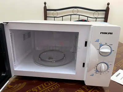 Nikai compact microwave oven - working, light wear