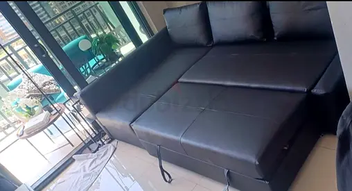 Black Leather Sofa Bed with Pull Out Section