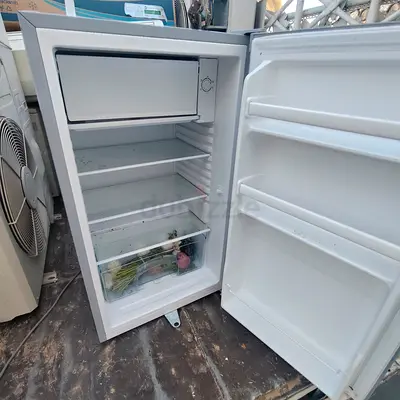 Small single-door fridge with freezer compartment - used
