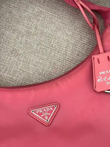 Compact pink shoulder bag — gently used