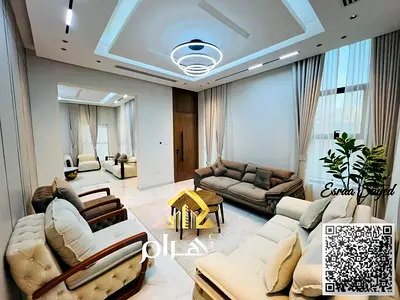 Villa for sale next to the mosque and near Sheikh Mohammed Bin Zayed Road, excellent finishing at an attractive price including registration fees and