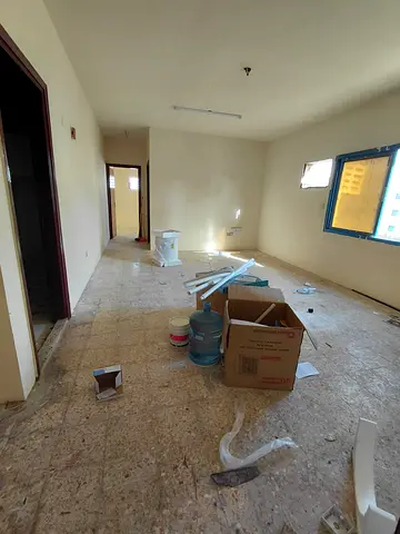 Official Bachelor Apartment For annual rent in Sharjah – Al Boutina Two rooms and a living room with very spacious areas, prime location on the main