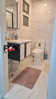 Two bedrooms and a living room in Al Khor Towers for annual rent Furnished Decorations Sea view Aski