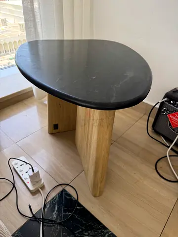 Round black-top wooden side table - good condition
