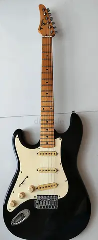 Selling branded registered Black Strat-style Electric Guitar - Used, Playable