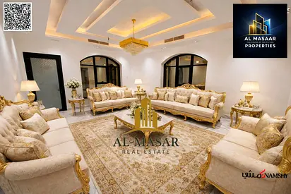 Luxury villa in Al-Aliya area, corner lot on 3 streets, price includes water, electricity, and air conditioning. Freehold ownership.