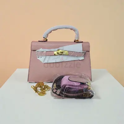 Elegant Pink Leather Handbag with Shoulder Strap