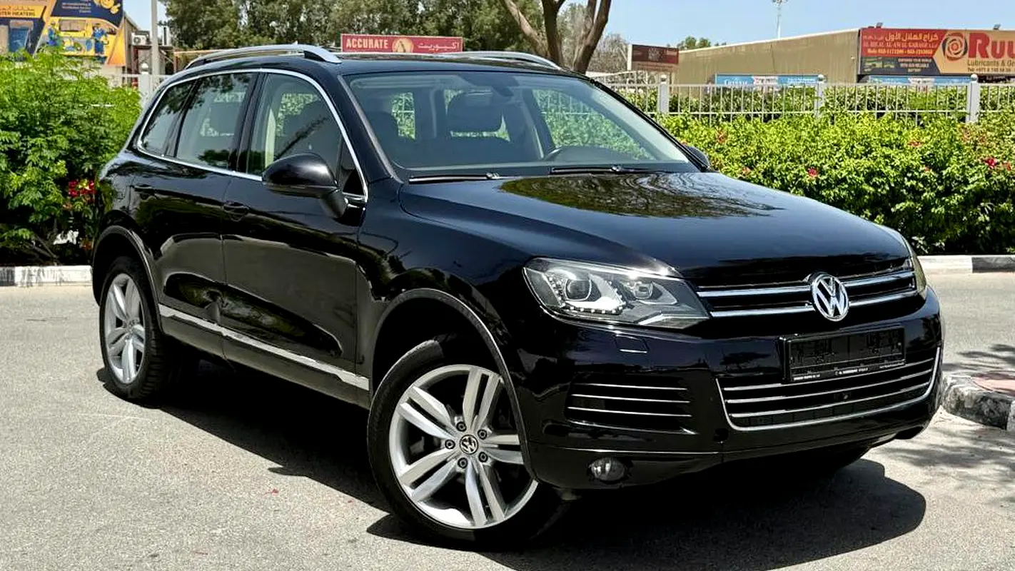 Volkswagen Touareg 2013 — photo 1 of 19