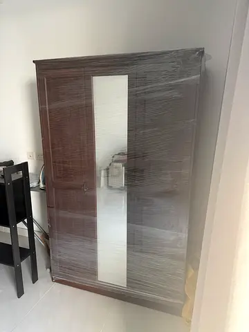 Dark wood double-door wardrobe with mirror - good condition