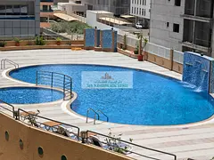 Furnished 1BR Apartment | Silicon Heights 2 | Pool &amp; City Views