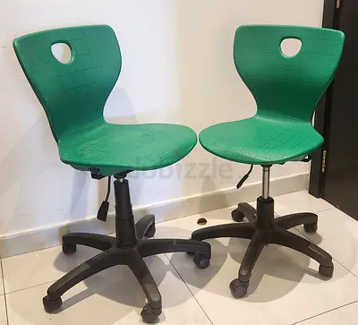 Pair of Adjustable Height Green Chairs with Wheels