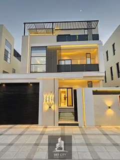 Two-story villa with a rooftop terrace and elevator. Price includes air conditioning, electricity, a