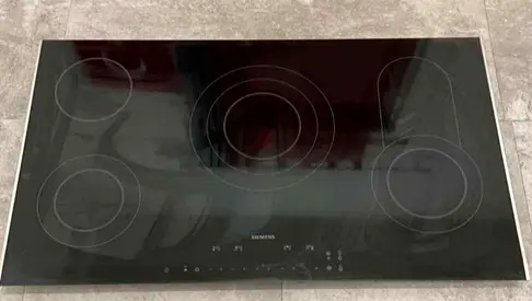 Siemens 90 cm built-in electric ceramic hob, specifically model ET975FKB1Q, featuring five cooking z