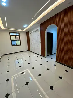 Luxurious two-bedroom apartment with a living room for annual rent in Rawda 3, including two bathroo