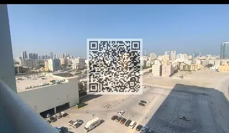 شقة غرفتين وصالة للبيع في أبراج الواحة الرشيدية عجمان بمساحة واسعة وموقع مميز