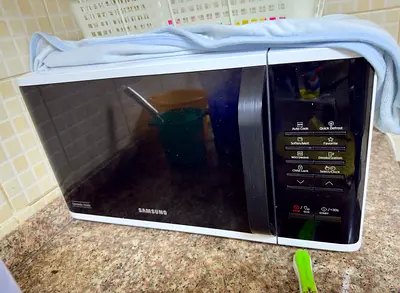 Samsung 23L Solo Microwave (White/Silver) - Good Working Condition