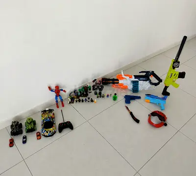 Mixed kids toys bundle — Nerf blasters, cars, action figures, controller