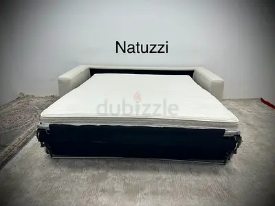 Perfect condition Natuzzi three seater sofa bed