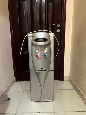 Used Sure Water Dispenser - Hot  Cold, Floor Standing