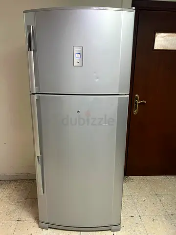 Silver Double‑Door Refrigerator - Good Working Condition