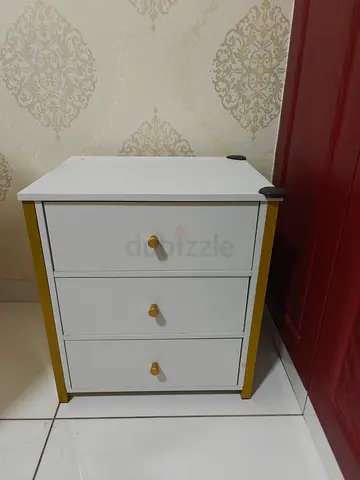 White Three Drawer Nightstand with Gold Trim