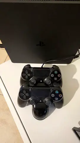 Sony PlayStation 4 Slim with 2 DualShock Controllers - Good Condition 1TB