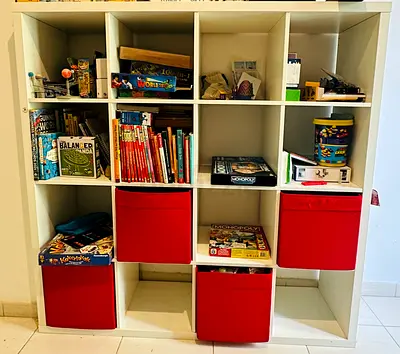 White 12-Cube Storage Shelves with Red Bins - Good Condition