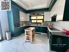 Furnished 5BR villa in Al Yasmeen, Ajman. Majlis, maid room, prime location. AED 140K/year, 4 paymen