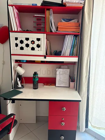 Red and white kids study desk with shelves and drawers( price negligible for serious people)