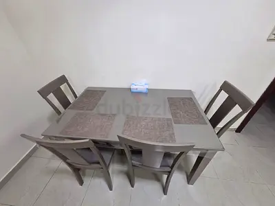 4-Seater Wooden Dining Table with Chairs - Good Condition