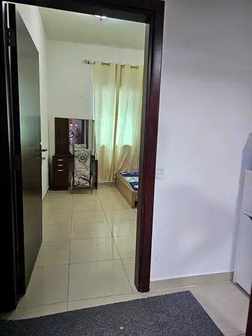 Spacious room available in a clean and well-maintained apartment, for couples  families