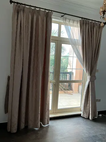 Pair of beige blackout curtains with sheer panels - good condition