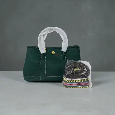 Green leather tote bag with interchangeable straps