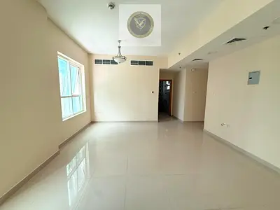 اول ساكن غرفتين وصاله مع باركن مجانى  للايجار السنوى فى التعاون  بإمارة الشارقه مساحات كبيره بلكونه اطلالات فى كل مكان  تشطيبات حديث