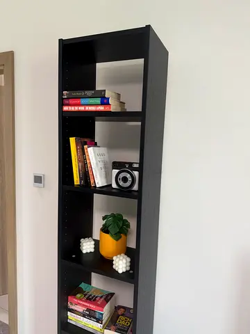 Used tall black bookshelf with five shelves — good condition