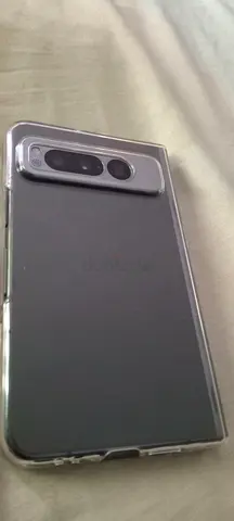 Google pixel fold phone with clear protective case - used, good condition