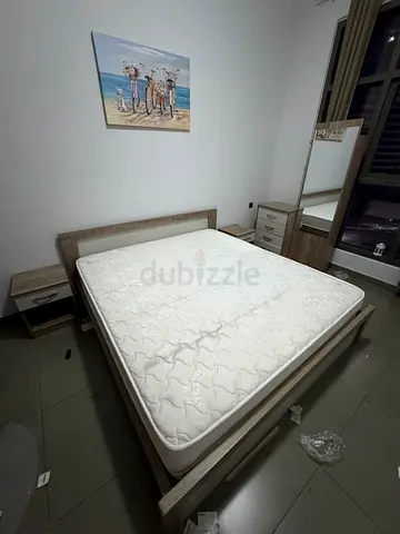 King-size bed frame with mattress, good condition