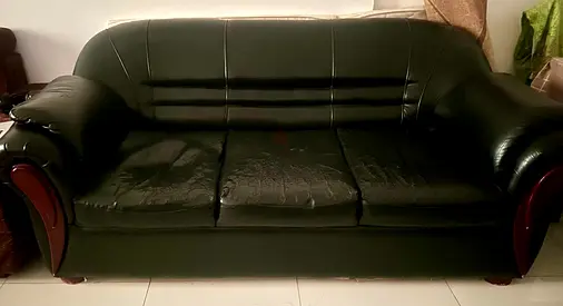 Dark green 3-seater leather sofa — good condition