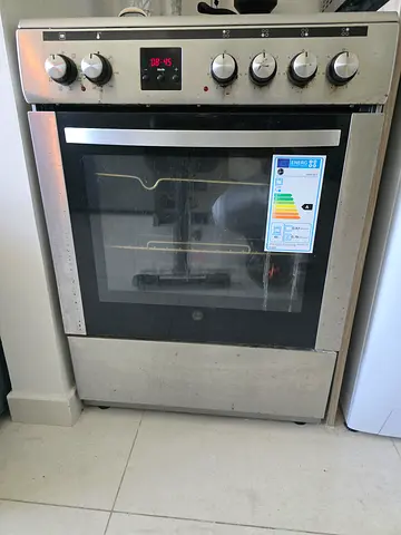 Stainless steel freestanding gas oven with glass door - good working condition