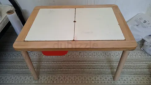 Wooden toddler activity table with removable play panels