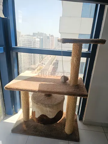 Used Multi-level Beige Cat Tree with Scratching Posts and Condo. 100m hight
