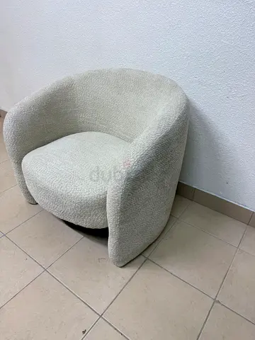 Lilt armchair in beige from Home Centre