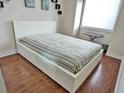 Ikea King White Malm bed frame with Ikea King mattress